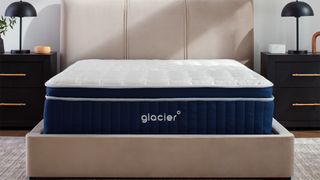 The Glacier Apex Hybrid mattress on a bed in a bedroom