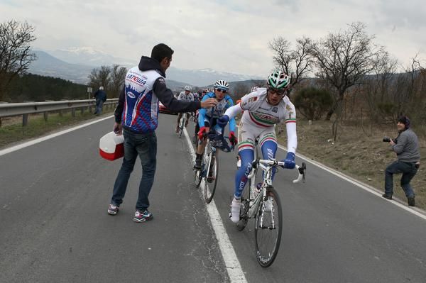 Pozzato gets a feed while in the break.