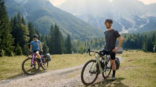 Two riders on Canyon Grizl AL gravel bikes in the mountains