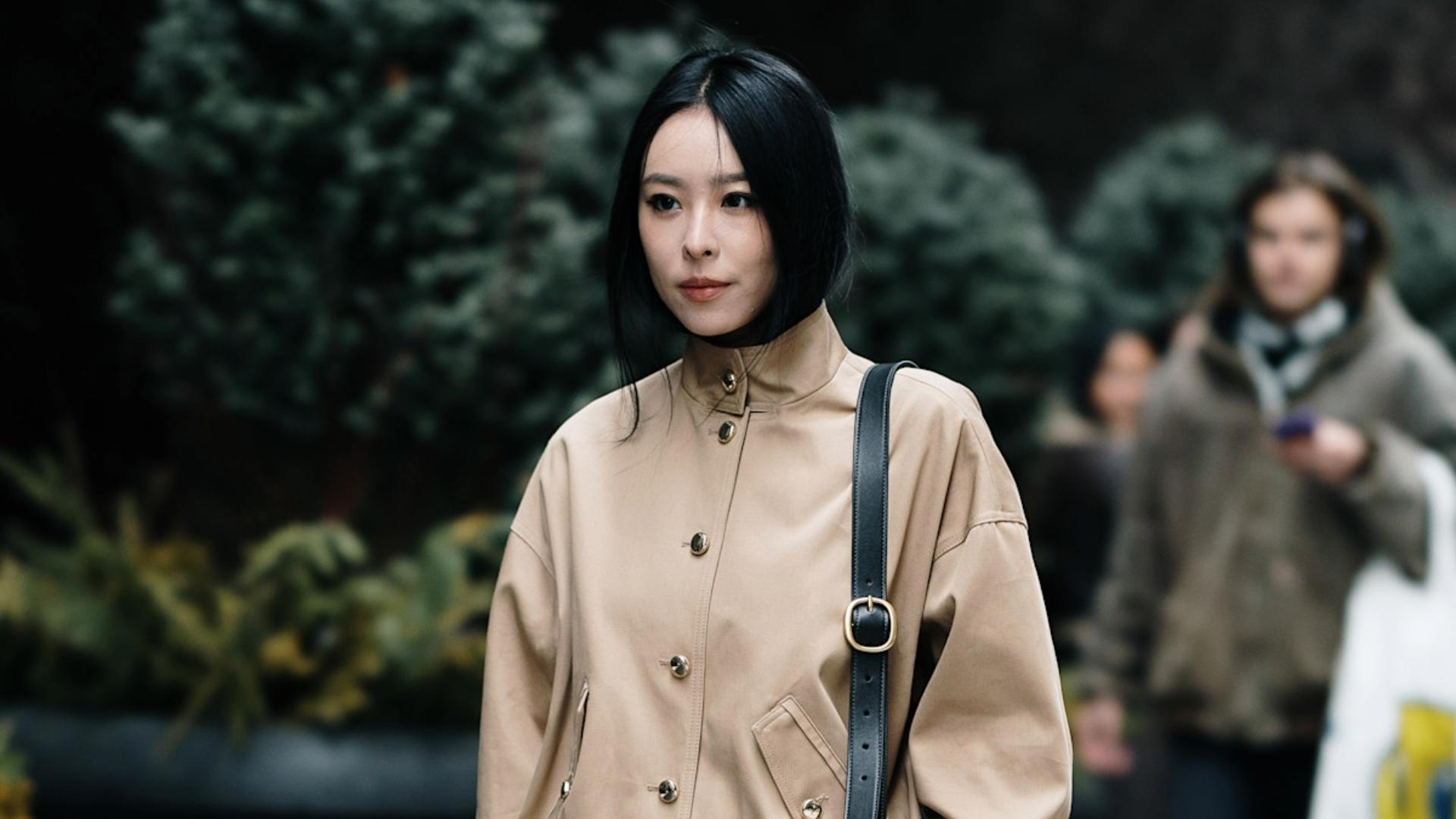 woman wearing a tan jacket in New York City