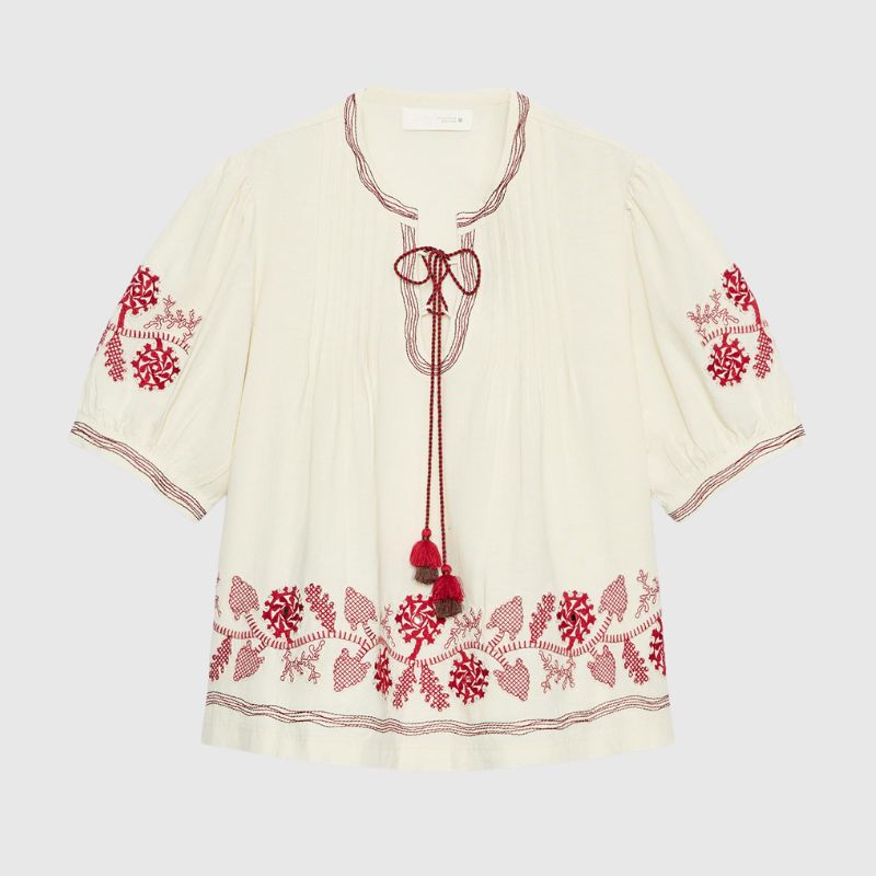 A cutout of a boho blouse with tassels from Zara