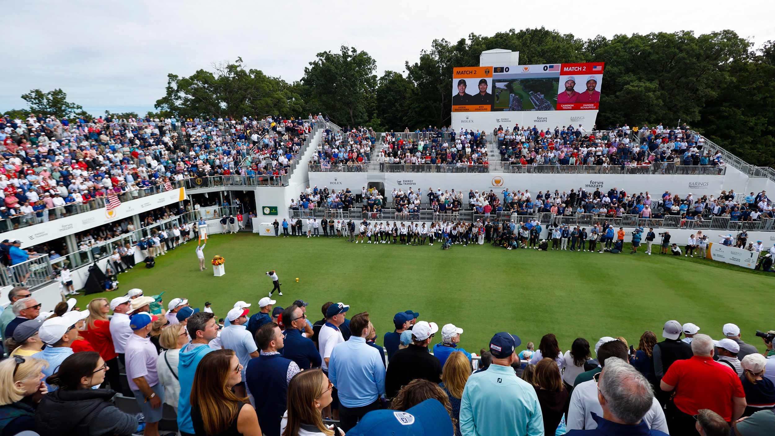 A golfer tees off the 1st hole at the 2026 Presidents Cup