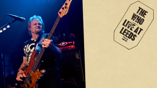 Michael Anthony onstage next to an image of the Who album Live At Leeds