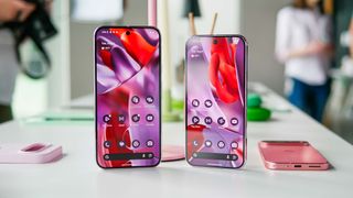 Pixel 9 Pro and Pixel 9 Pro XL on a table showing the homescreen