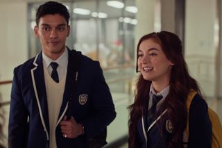 Anthony Keyvan as Quincy 'Q' Shabazian and Anna Cathcart as Kitty Song Covey in 'XO, Kitty' wearing their kiss school blazers in season 2.