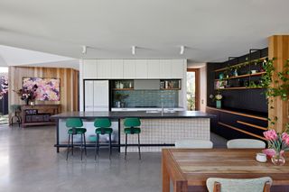 a kitchen with a polished concrete floor