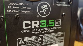 The rear of a Mackie CR3.5 BT reference monitor showing the Mackie logo