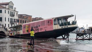 A water taxi sits moored in a Venetian courtyard following the second-highest tide in the city's history.