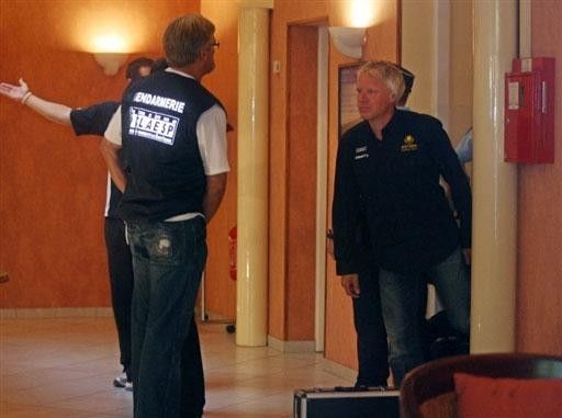 French gendarmes talk with an unidentified