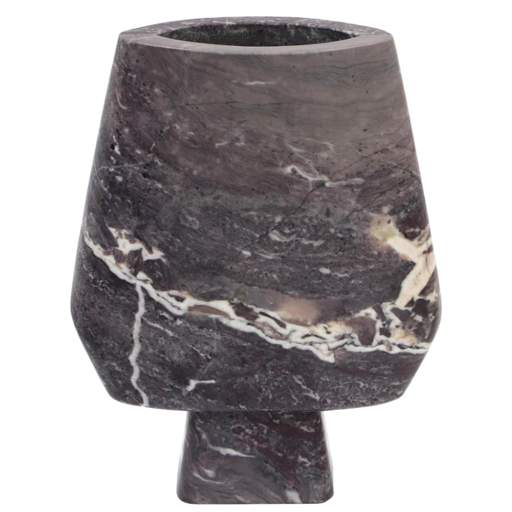 a round stone plant pot