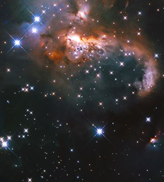 A Hubble Space Telescope image shows part of the Snowman Nebula, a region filled with warm gas.