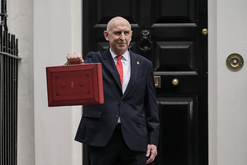 Britain's Chancellor of the Exchequer John Healey poses with the Budget Box as he leaves 11 Downing Street in central London on October 28, 2026