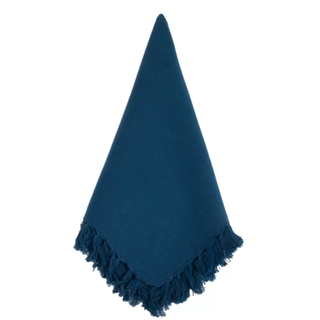 blue napkin with tassle details