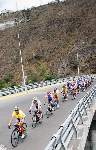 The peloton crosses a bridge during the fifth stage of the Vuelta al Ecuador.