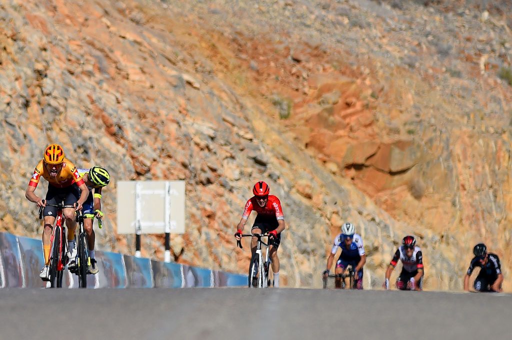 QURAYYAT OMAN FEBRUARY 12 LR Anthon Charmig of Denmark and UNO X Pro Cycling Team sprints to win ahead of Jan Hirt of Czech Republic and Team Intermarch Wanty Gobert Matriaux Elie Gesbert of France and Team Arka Samsic Fausto Masnada of Italy and Team QuickStep Alpha Vinyl and Rui Alberto Faria Da Costa of Portugal and UAE Team Emirates during the 11th Tour Of Oman 2022 Stage 3 a 180km stage from Sultan Qaboos University to Qurayyat 240m TourofOman on February 12 2022 in Qurayyat Oman Photo by Dario BelingheriGetty Images