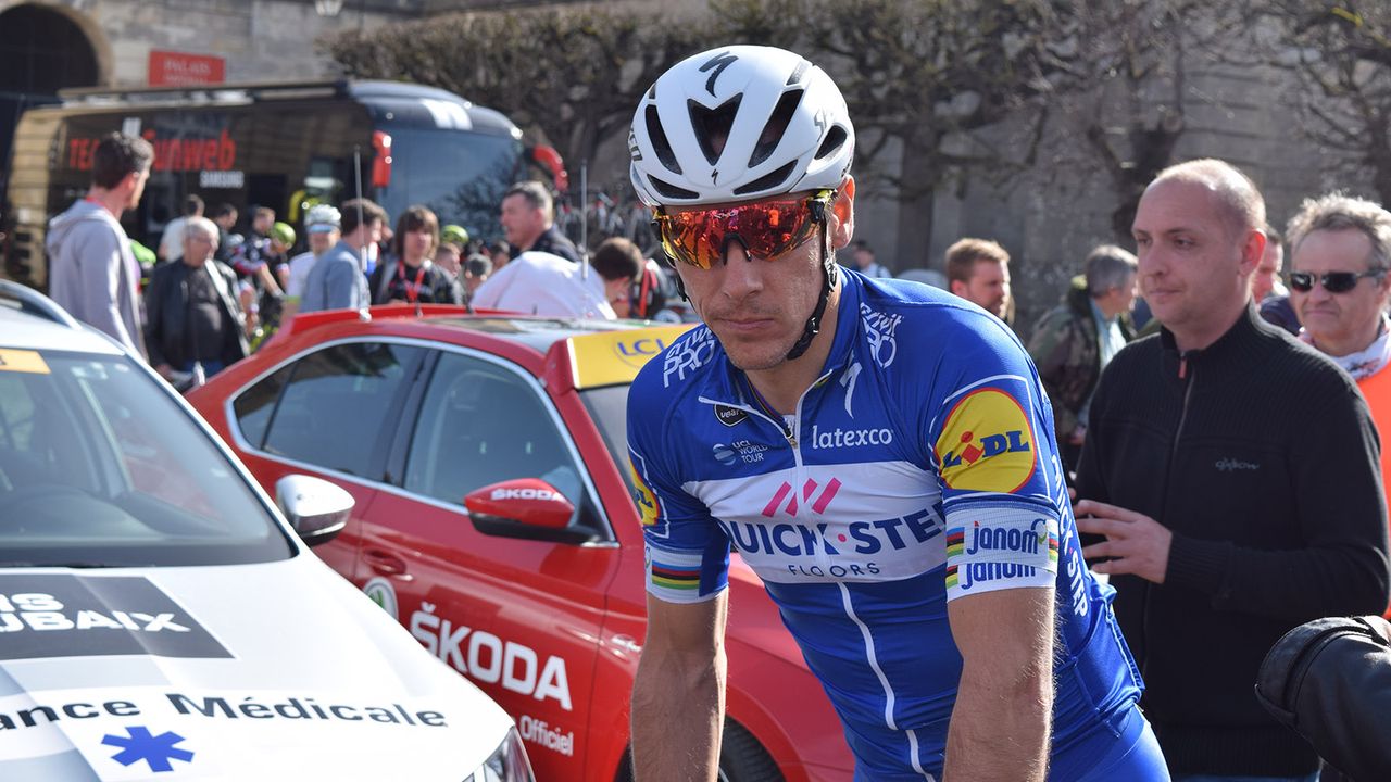 Philippe Gilbert (Quick-Step Floors) with the rainbow arm bands of a former world champion and sunglasses in the national champion colours of Belgium