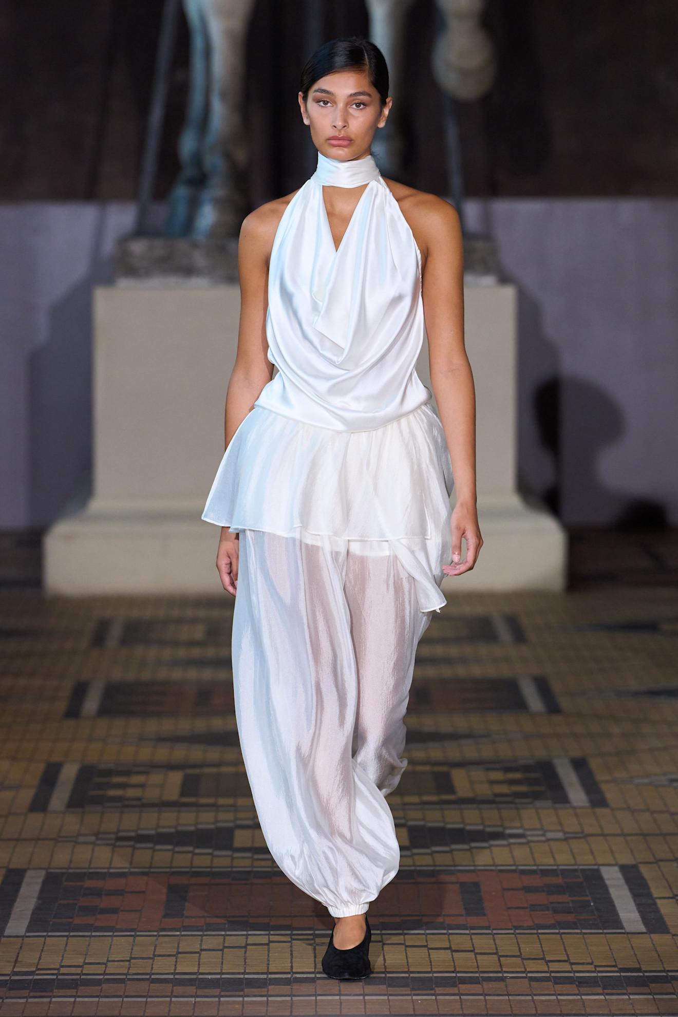 Runway model walking in show at Copenhagen Fashion Week spring/summer 2027.