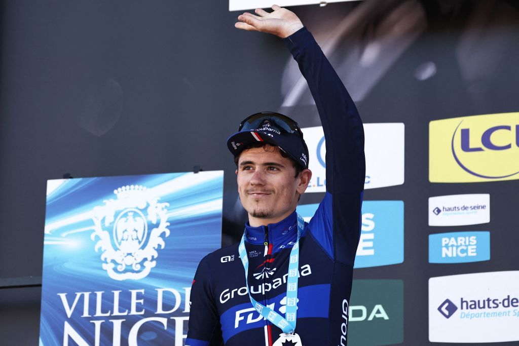 Overall second placed GroupamaFDJs French rider David Gaudu celebrates on the overall podium after the 8th and final stage of the 81st Paris Nice cycling race 1175 km between Nice and Nice in French riviera city of Nice southeastern France on March 12 2023 Photo by AnneChristine POUJOULAT AFP Photo by ANNECHRISTINE POUJOULATAFP via Getty Images