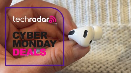 An AirPod Pro 3 held in a hand, with TR's 'Cyber Monday deals' badge