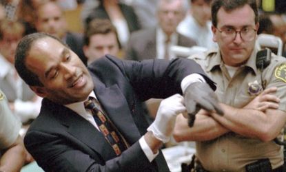 In one of the most famous scenes of O.J. Simpson's 1995 trial, the defendant grimaces as he tries to squeeze on one of the leather gloves linked to his ex-wife's murder.