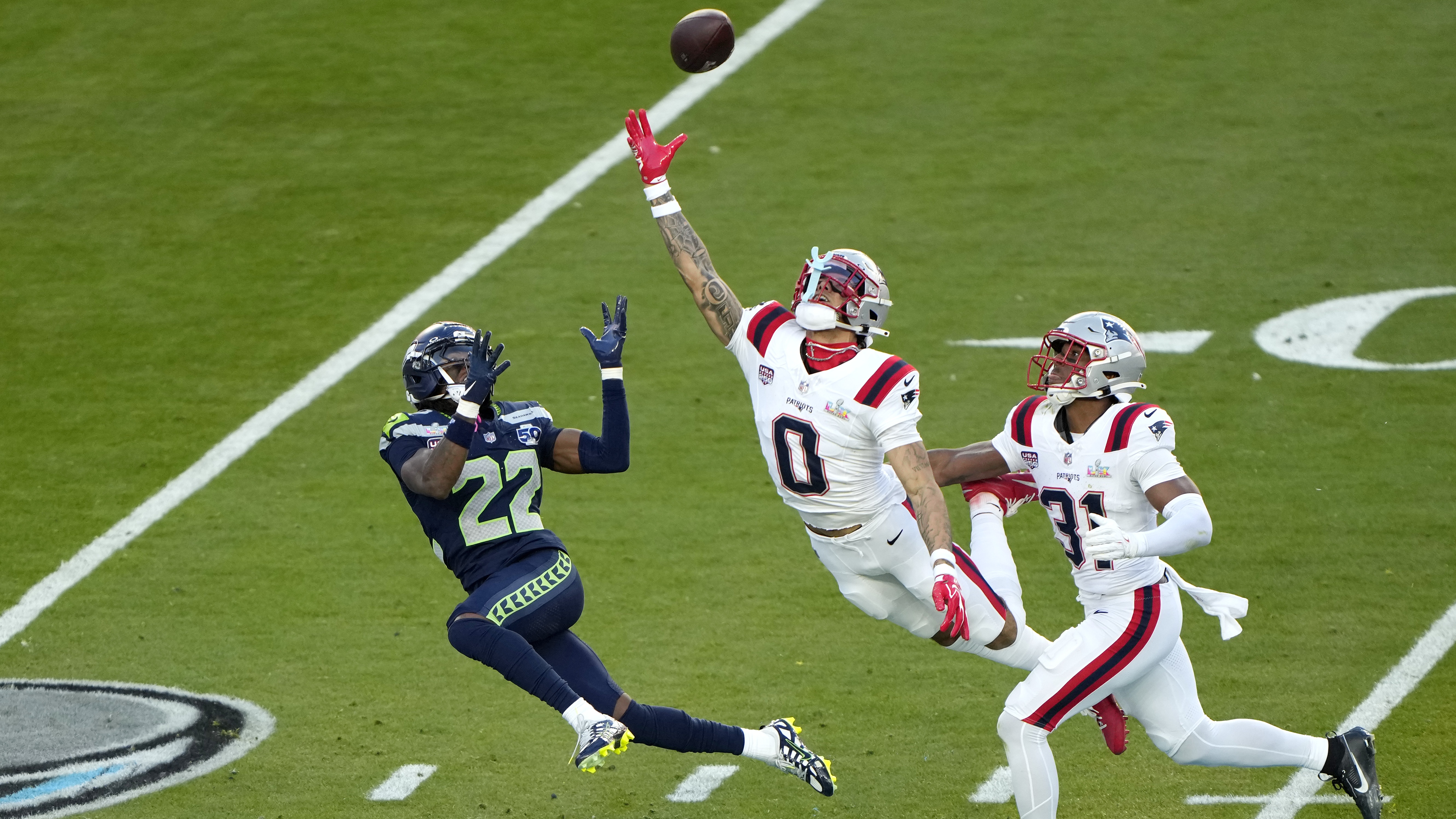 Christian Gonzalez #0 of the New England Patriots breaks up a pass intended for for Rashid Shaheed #22 of the Seattle Seahawks during the second quarter in Super Bowl LX at Levi's Stadium on February 08, 2026 in Santa Clara, California.