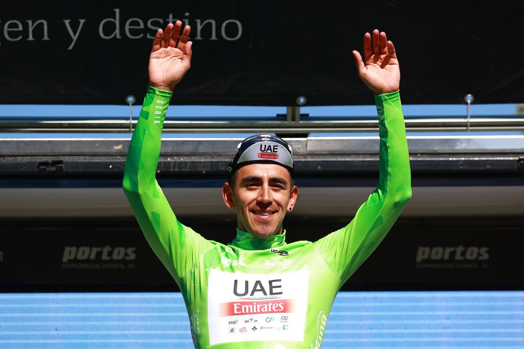 POZA DE LA SAL SPAIN AUGUST 16 Juan Sebastian Molano Benavides of Colombia and UAE Team Emirates celebrates at podium as Green points jersey winner during the 45th Vuelta a Burgos 2023 Stage 2 a 131km team time trial from Oa to Poza de la Sal on August 16 2023 in Poza de la Sal Spain Photo by Gonzalo Arroyo MorenoGetty Images