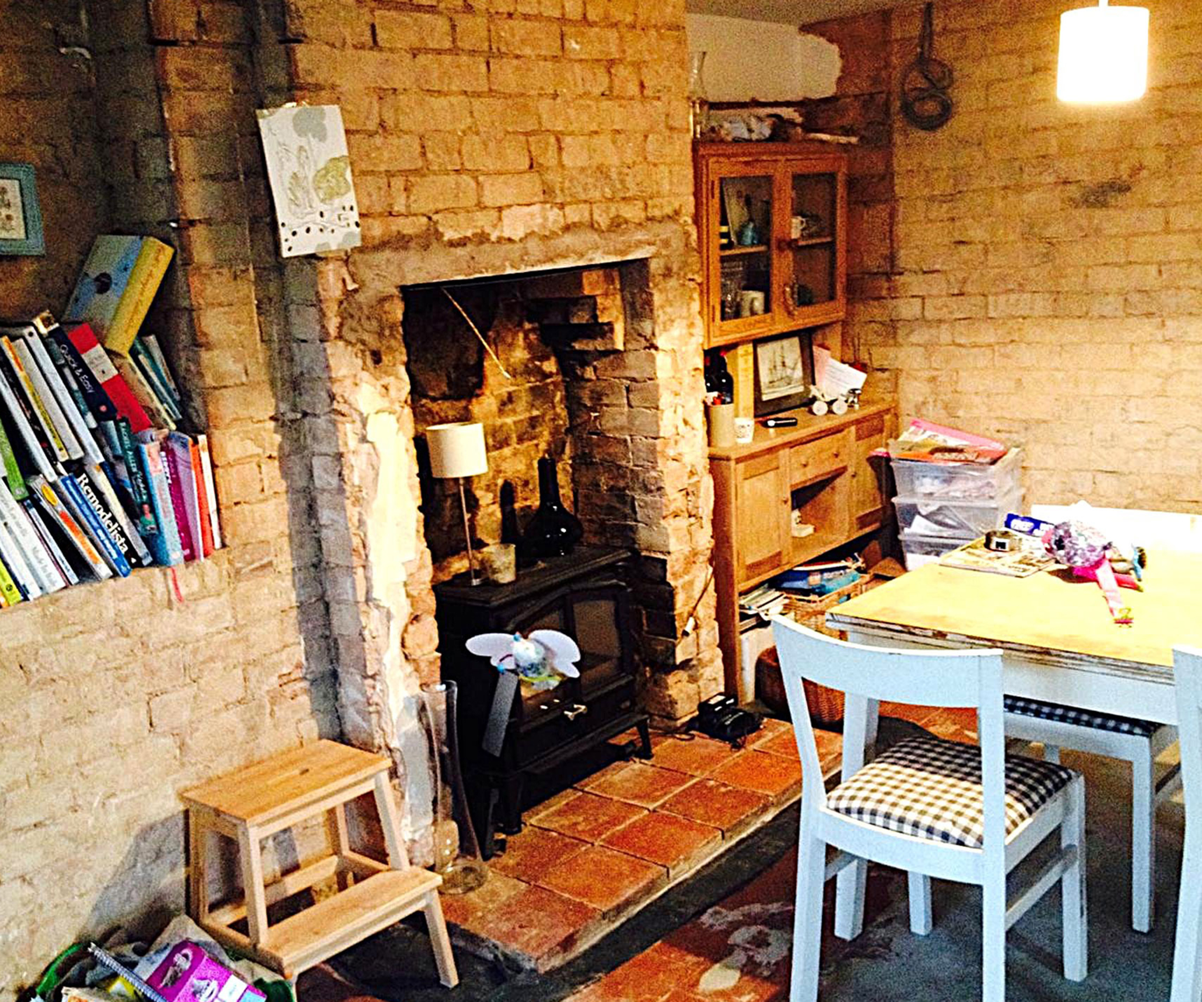 renovation project dining room with stripped brick walls
