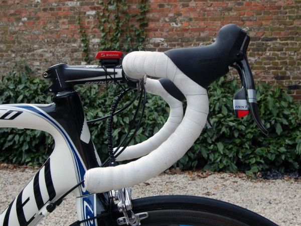 SRAM Red DoubleTap levers are mounted high on Cancellara's FSA Energy New Ergo aluminum handlebar.