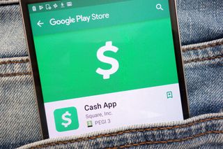 Cash App logo on a smartphone.