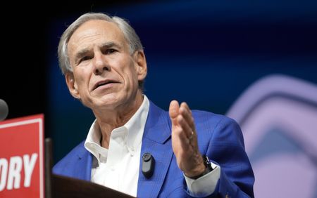 Texas Gov. Greg Abbott speaking on a podium