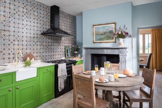 blue and green kitchen with patterned tiles