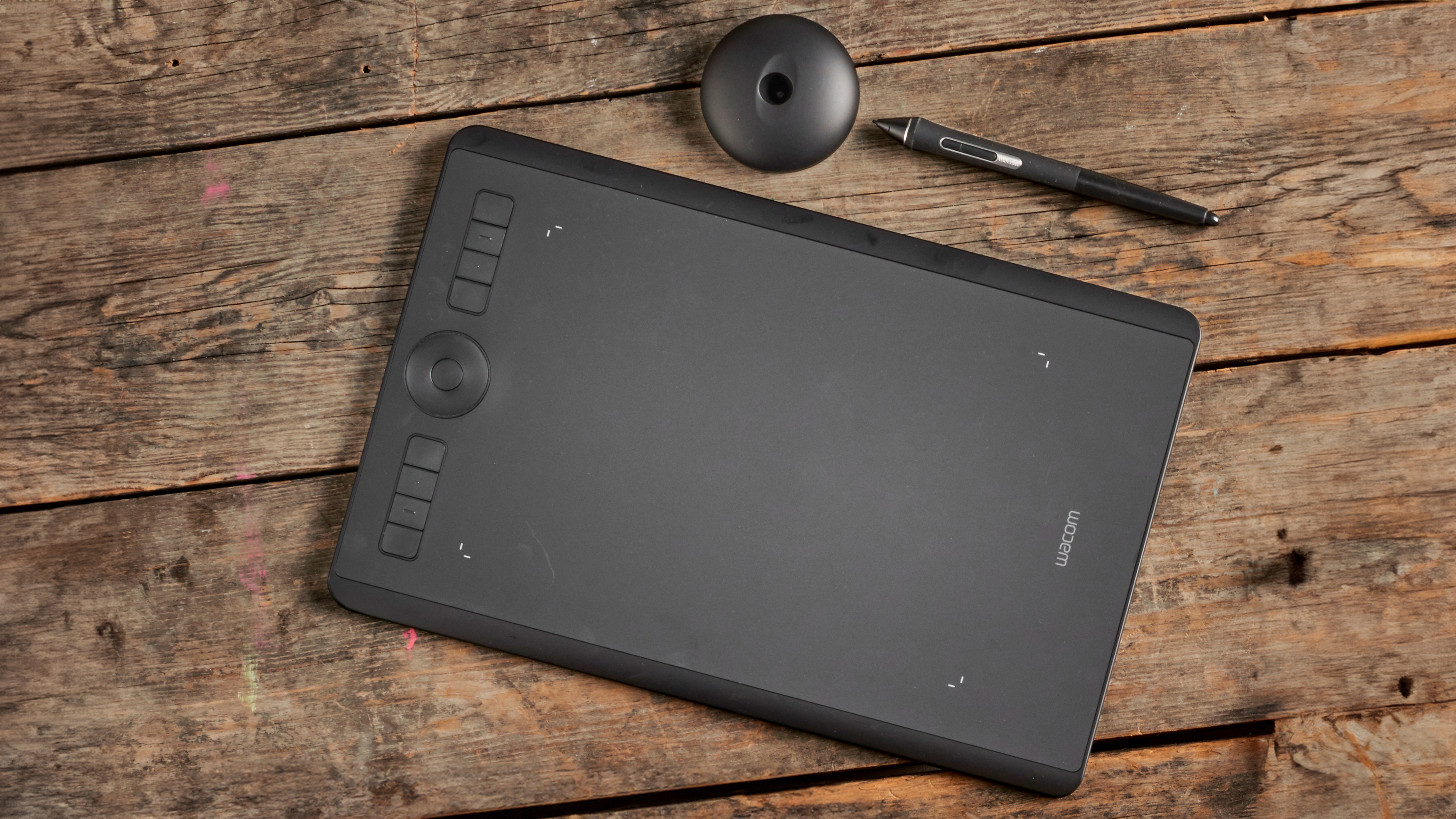 Best drawing tablets; product shot of Wacom Intuos Pro on wooden floorboards