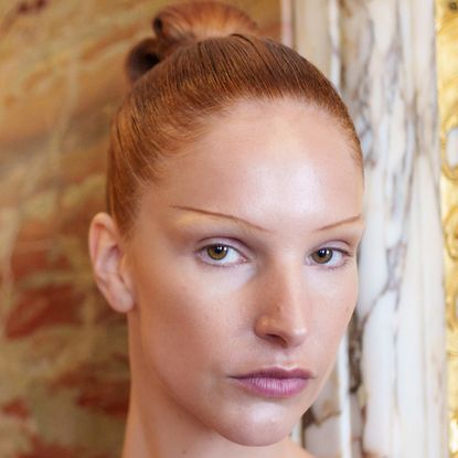 A model posing in front of the camera