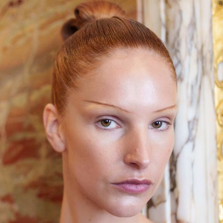 A model posing in front of the camera