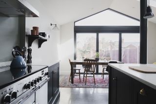 bifold patio doors with a fixed glazing gable window