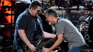 Bassist Wolfgang Van Halen (L) and guitarist Eddie Van Halen of Van Halen perform during the 2015 Billboard Music Awards at MGM Grand Garden Arena on May 17, 2015 in Las Vegas, Nevada. 