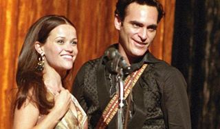 Reese Witherspoon as June Carter Cash and Joaquin Phoenix as Johnny Cash in Walk The Line