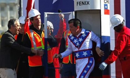 Stephen Colbert emerges from a "fear bunker" chanting "Chi-le! Chi-le!"