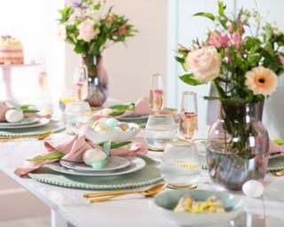 Easter tablescape featuring mixed pastel hues and fresh spring florals.