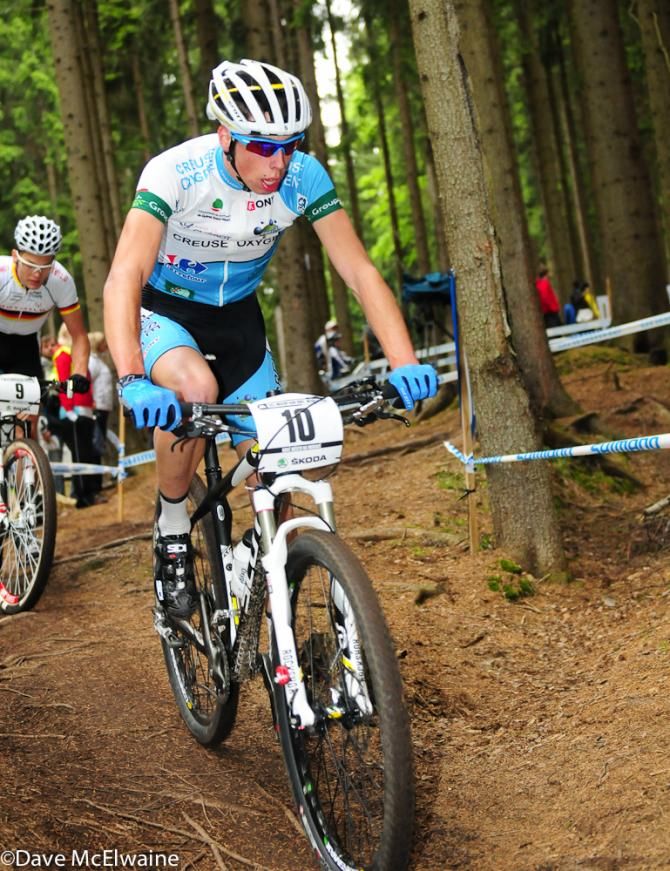 Romain Boutet (Creuse Oxygene) riding in second position behind his teammate