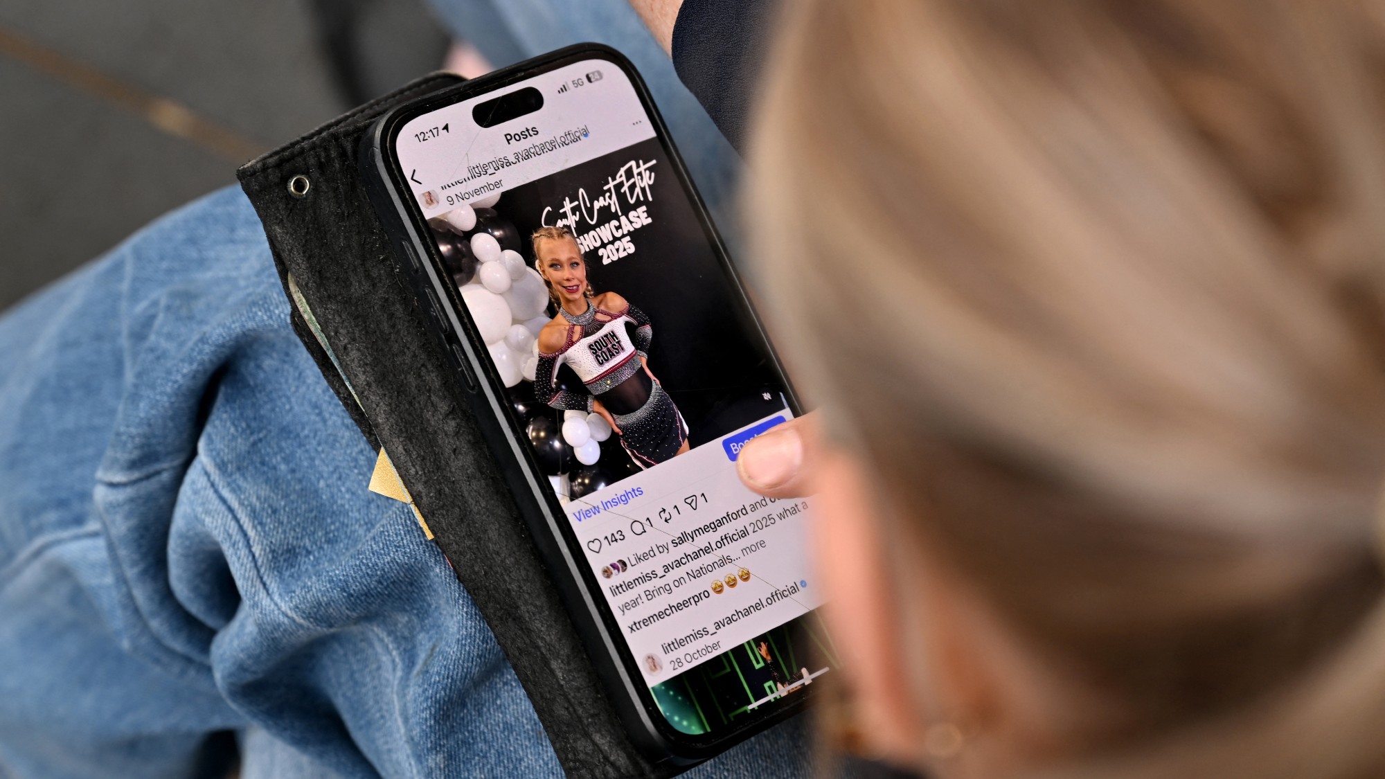 A phone displaying an Instagram post by 12-year-old Australian influencer Ava Jones 