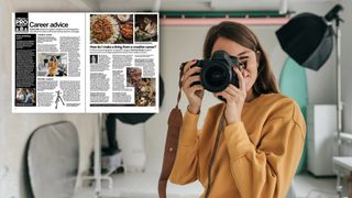 Person in a yellow sweater taking a photo in a studio, with a magazine article on photography in view