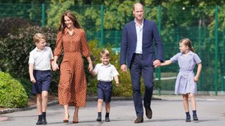 Prince George, Princess Charlotte and Prince Louis arrive for a settling in afternoon at Lambrook School in 2022 accompanied by the Prince and Princess of Wales