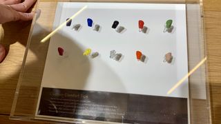 Sennheiser Custom Comfort Tips in all 10 colorways, in a case at High End Munich