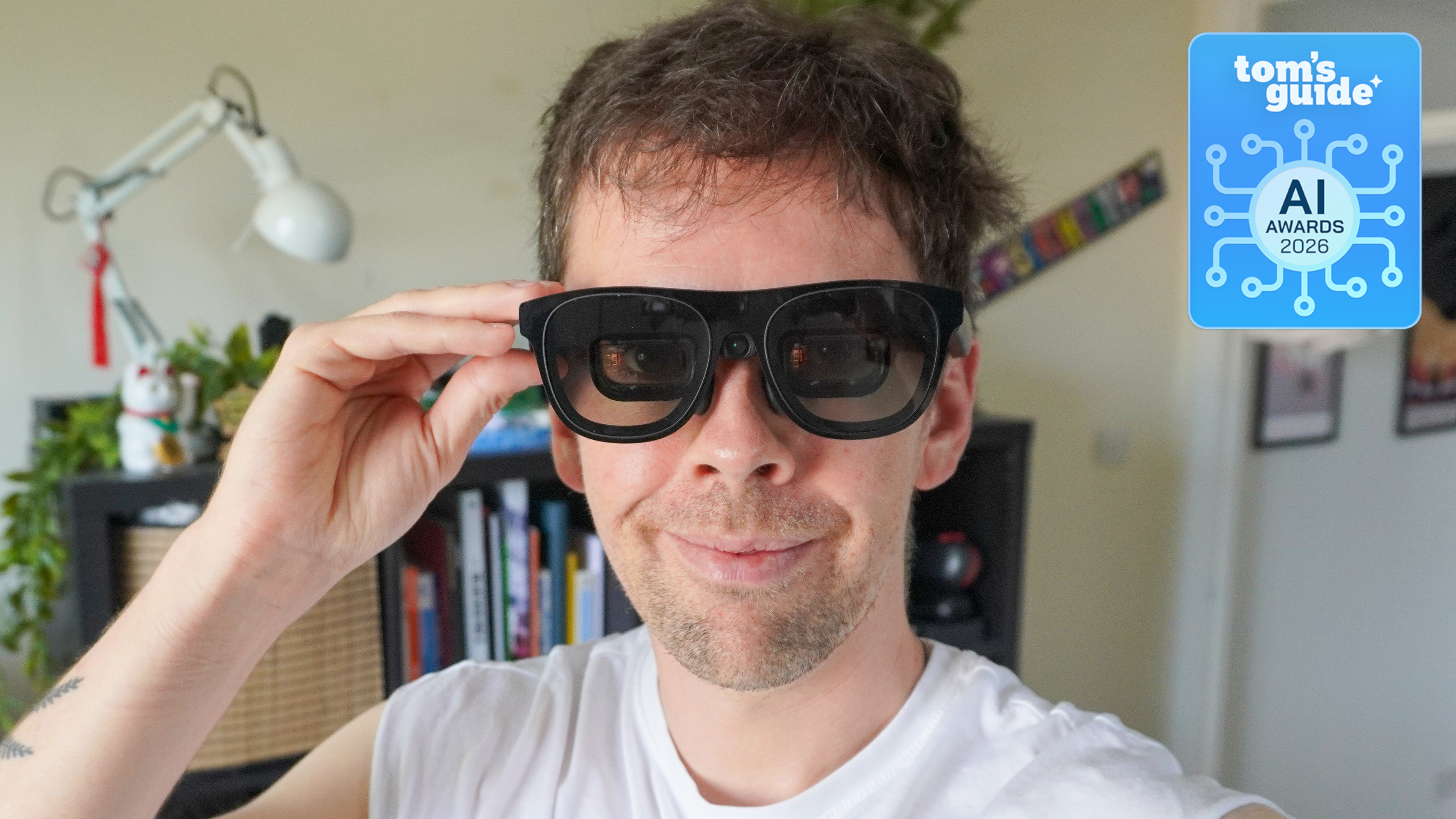 The Xreal One Pro AR glasses worn by a person with a Tom's Guide AI Awards 2026 badge