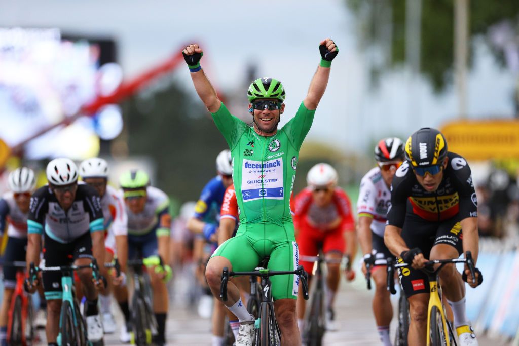 VALENCE FRANCE JULY 06 Mark Cavendish of The United Kingdom and Team Deceuninck QuickStep Green Points Jersey Green Points Jersey stage winner celebrates at arrival Wout Van Aert of Belgium and Team JumboVisma during the 108th Tour de France 2021 Stage 10 a 1907km stage from Albertville to Valence LeTour TDF2021 on July 06 2021 in Valence France Photo by Tim de WaeleGetty Images