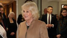 Queen Camilla meets members of staff during a visit to Deacon & Son Jewellers in Swindon