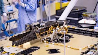 The Mars Helicopter and its Mars Helicopter Delivery System were attached to the Perseverance Mars rover at Kennedy Space Center on April 6, 2020. The helicopter will be deployed about two-and-a-half months after Perseverance lands.