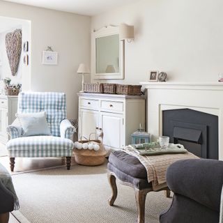 White living room with blue gingham armchair
