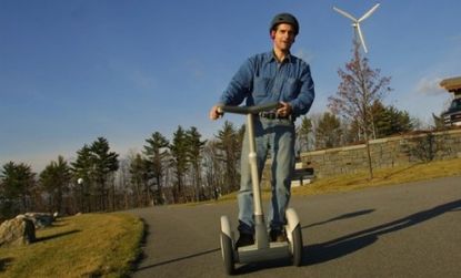Dean Kamem, pictured in 2002, invented the Segway Human Transporter and James Heseldon took over the company in 2009. 